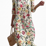 Élise - Robe d'été féminine à motifs floraux.
